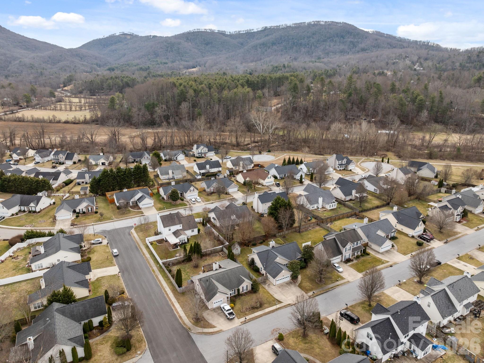 244 Running Briar Road Fletcher, NC 28732 - Photo 45 of 45 an aerial view of residential house with green space and mountain view