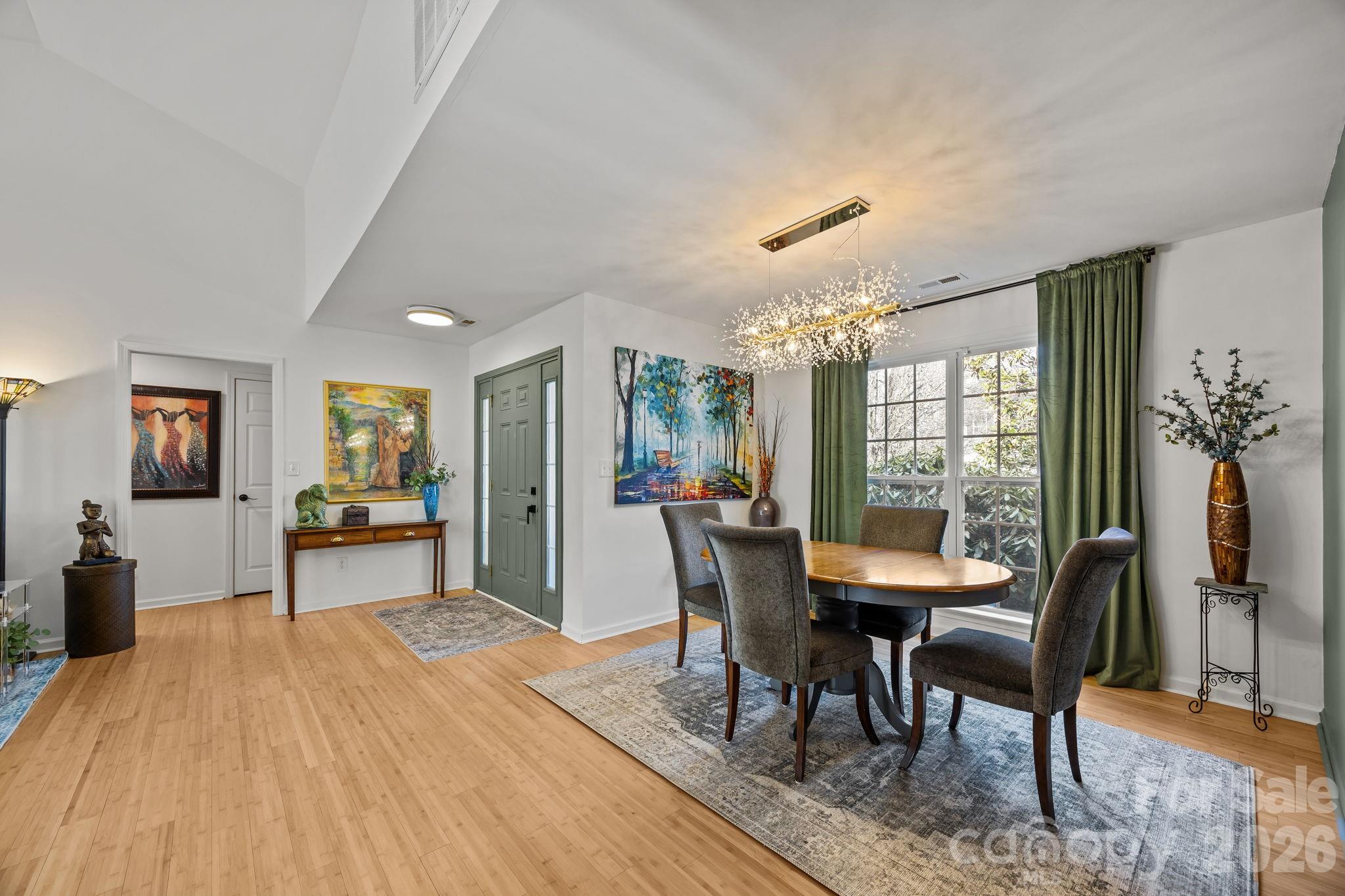 244 Running Briar Road Fletcher, NC 28732 - Photo 8 of 45 a dining room with furniture and window