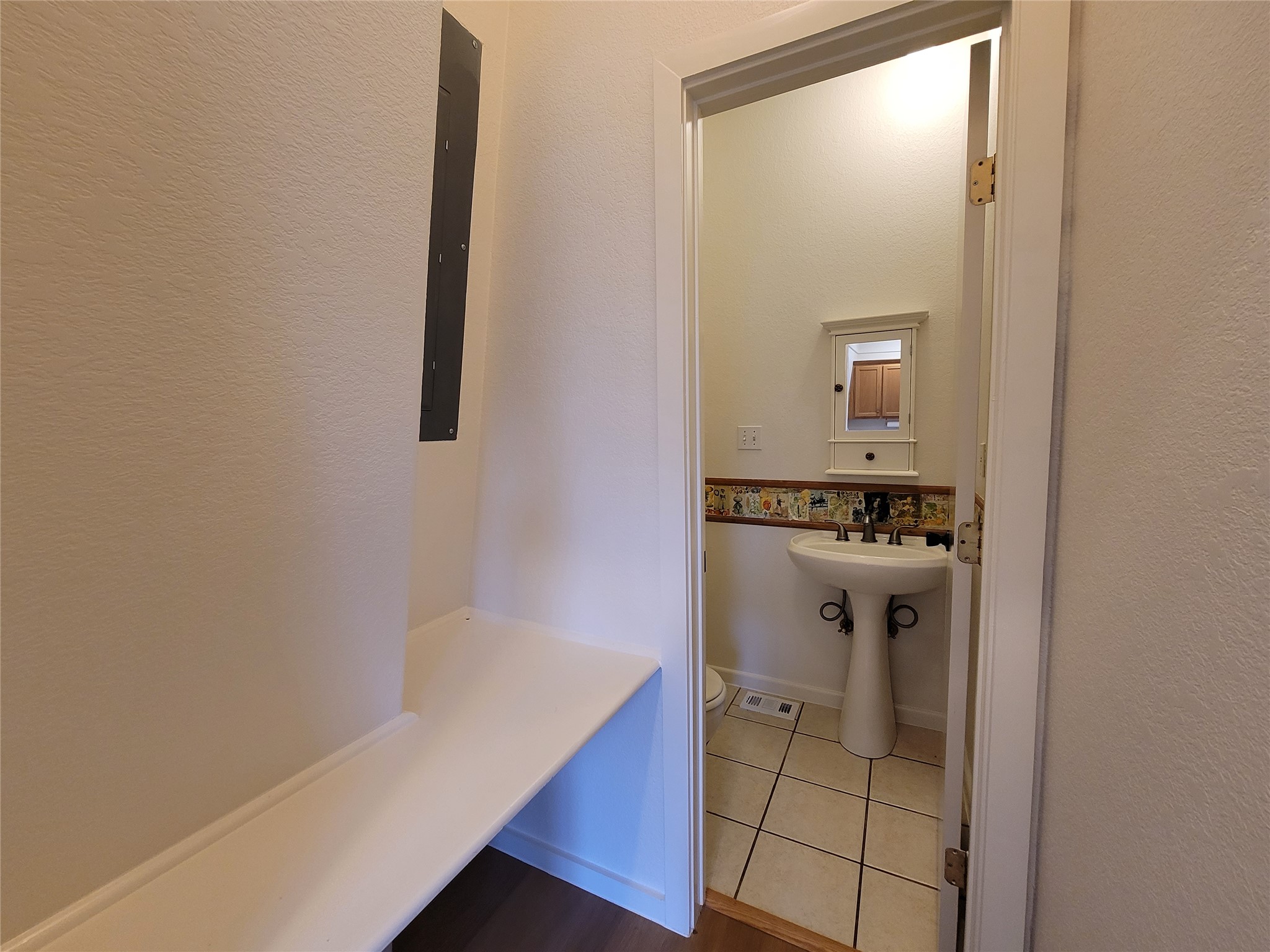 281 Earl Callahan Road, Unit A Cedar Creek, TX 78612 - Photo 16 of 39 a bathroom with a sink and a mirror