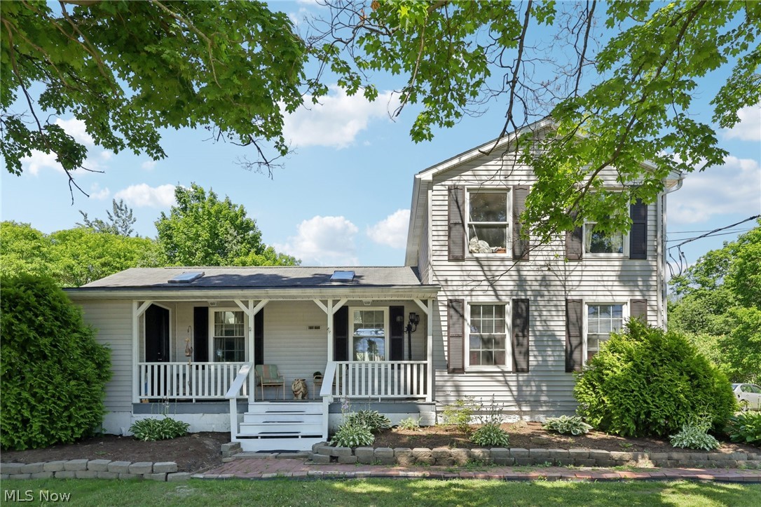 16146 Ravenna Road Burton, OH 44021 - Photo 1 of 27 View of front facade with covered porch