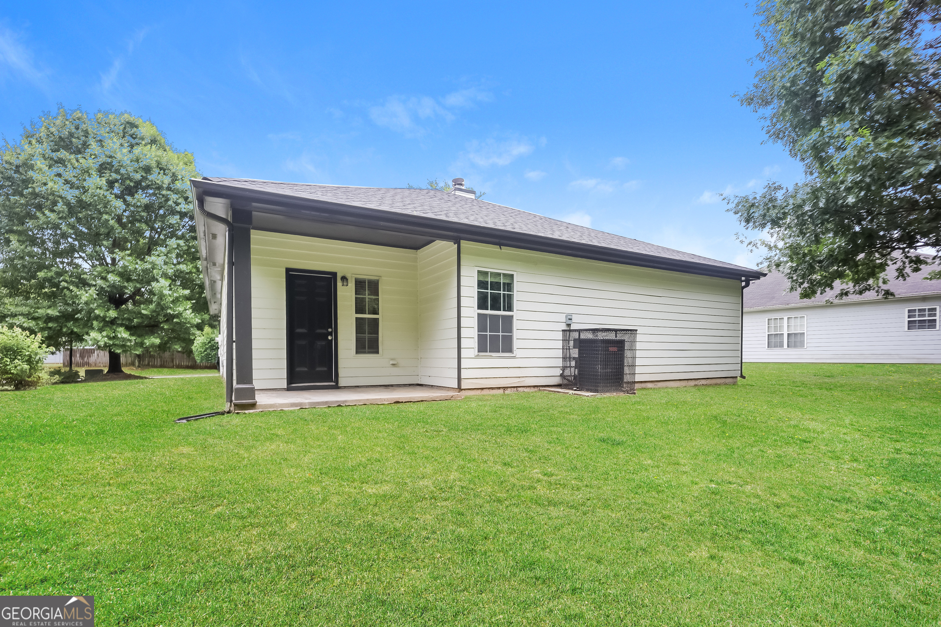 5517 Jerome Road South Fulton, GA 30349 - Photo 15 of 16 a view of a house with a yard