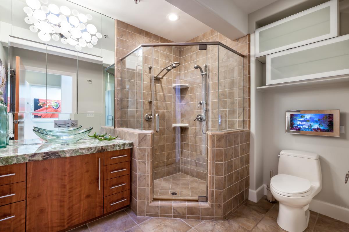 123 Ocean Boulevard Half Moon Bay, CA 94019 - Photo 11 of 30 a bathroom with a granite countertop sink toilet and shower