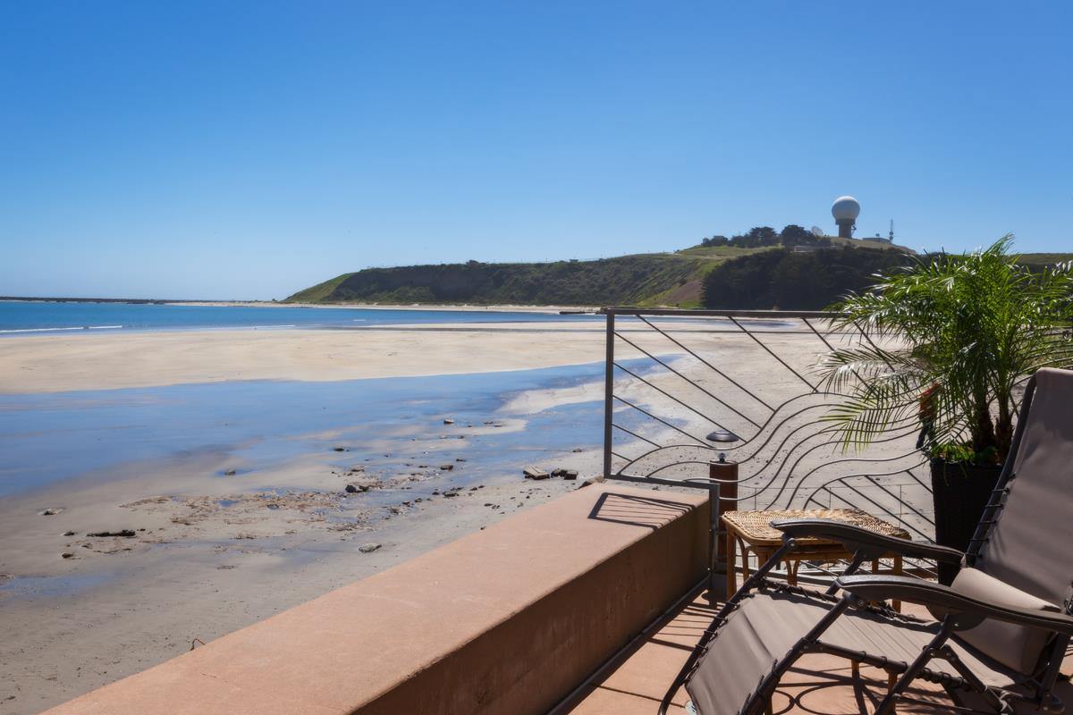 123 Ocean Boulevard Half Moon Bay, CA 94019 - Photo 16 of 30 a view of an ocean and beach