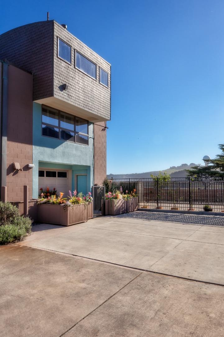123 Ocean Boulevard Half Moon Bay, CA 94019 - Photo 18 of 30 a view of a car park in front of house