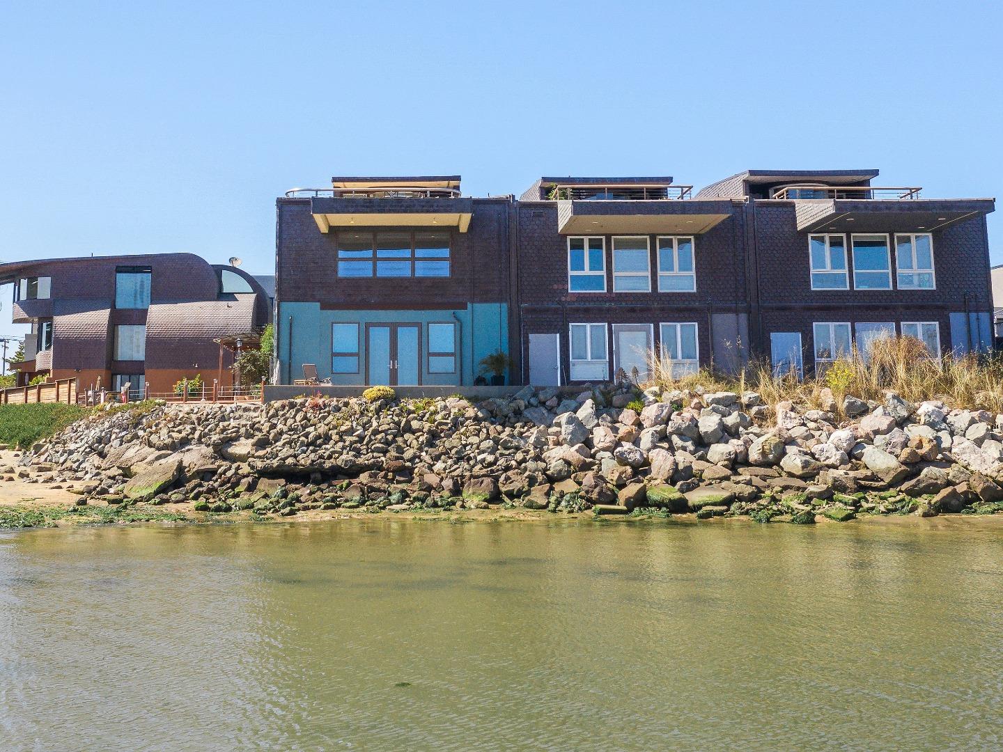 123 Ocean Boulevard Half Moon Bay, CA 94019 - Photo 27 of 30 a front view of a house with lake view