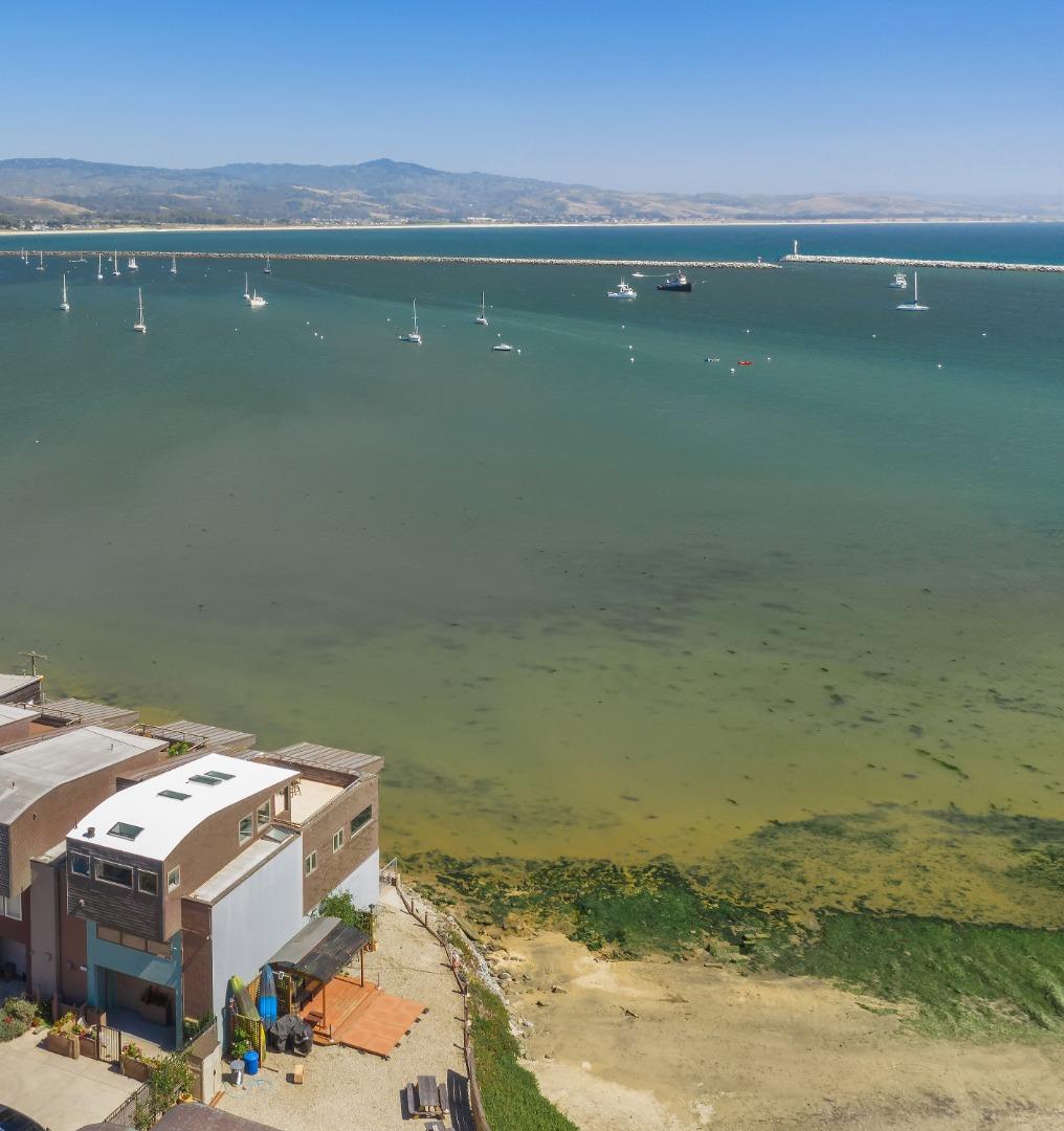 123 Ocean Boulevard Half Moon Bay, CA 94019 - Photo 29 of 30 a aerial view of a houses with a lake view