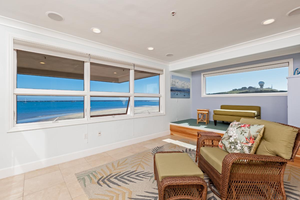 123 Ocean Boulevard Half Moon Bay, CA 94019 - Photo 7 of 30 a bedroom with a bed and furniture