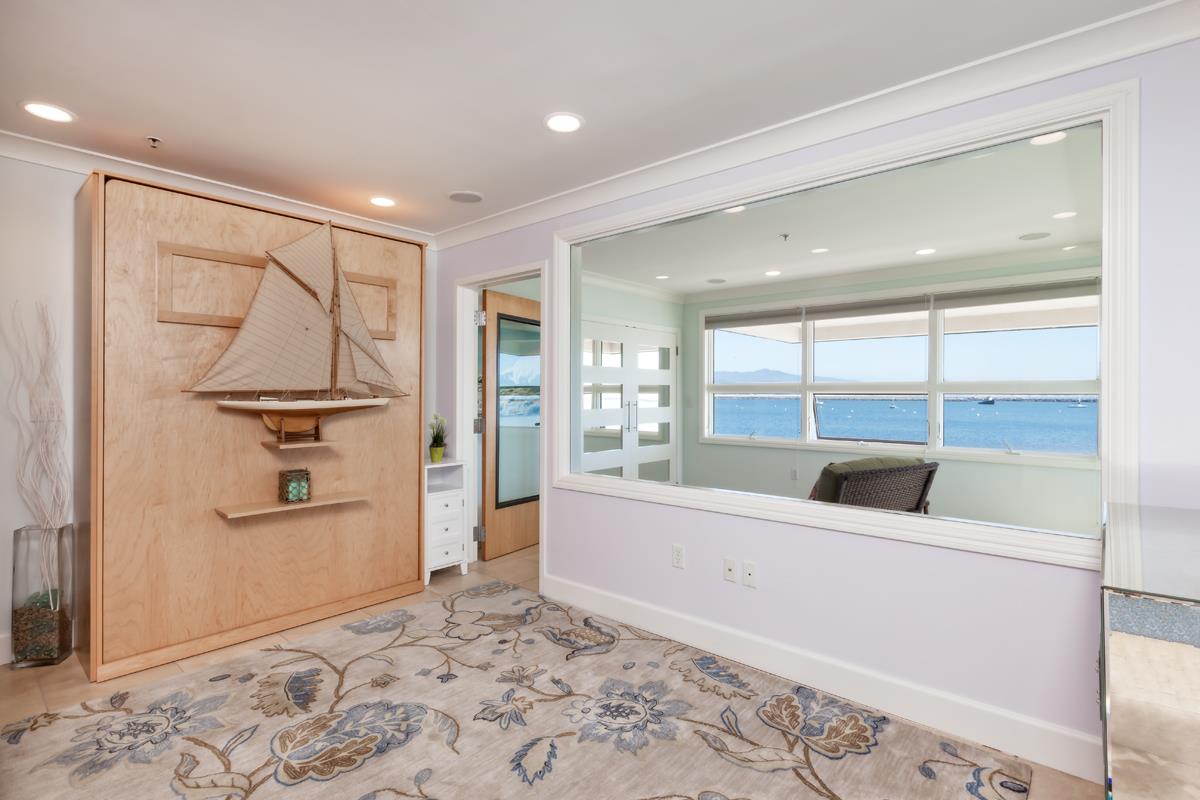 123 Ocean Boulevard Half Moon Bay, CA 94019 - Photo 8 of 30 a living room with stainless steel appliances furniture and a large window