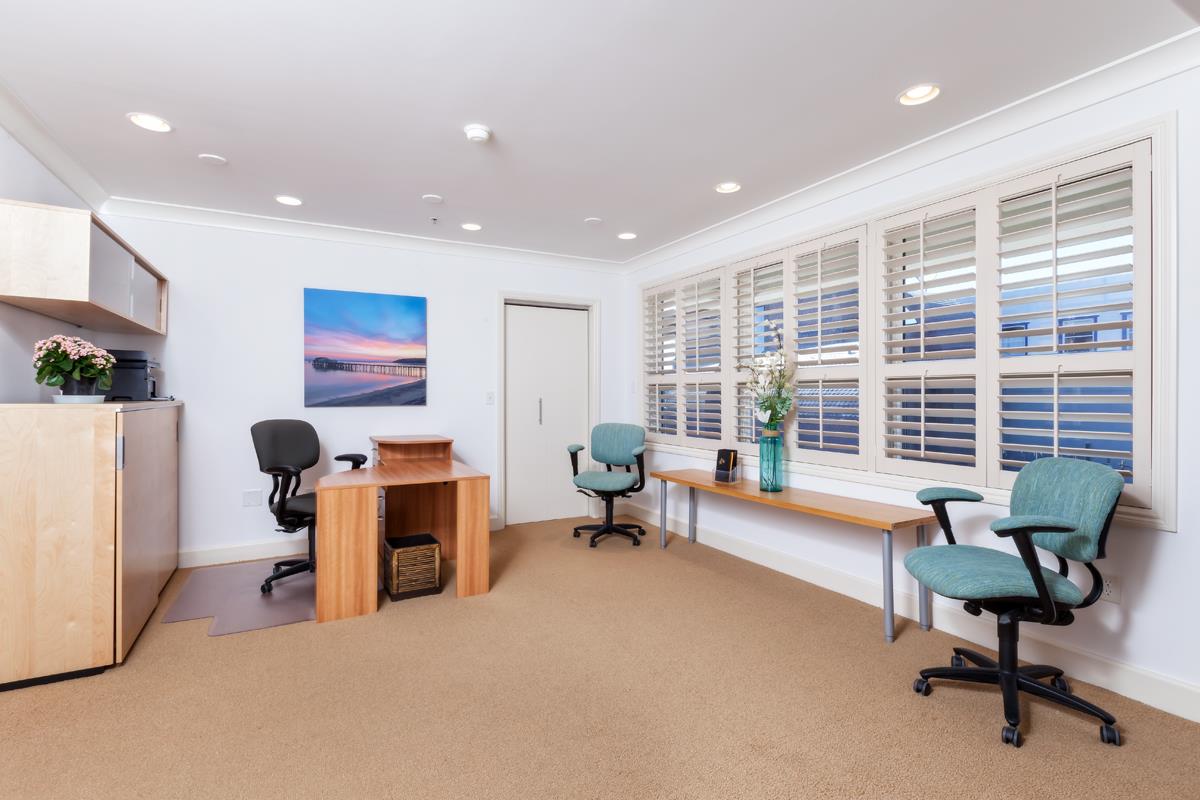 123 Ocean Boulevard Half Moon Bay, CA 94019 - Photo 10 of 30 a living room with furniture and a window