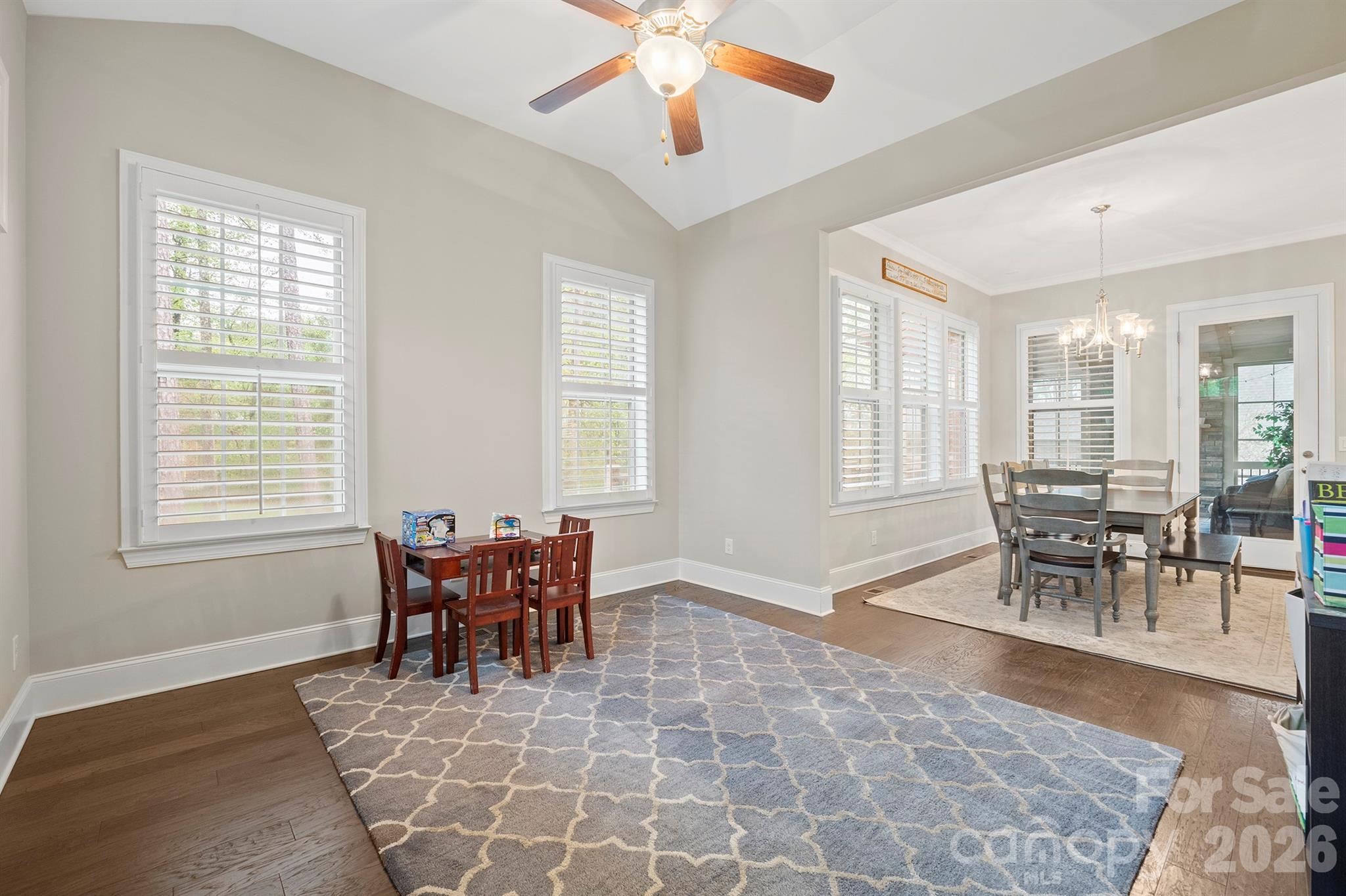 13044 Fen Court Huntersville, NC 28078 - Photo 17 of 43 a view of a dining room with furniture and chandelier