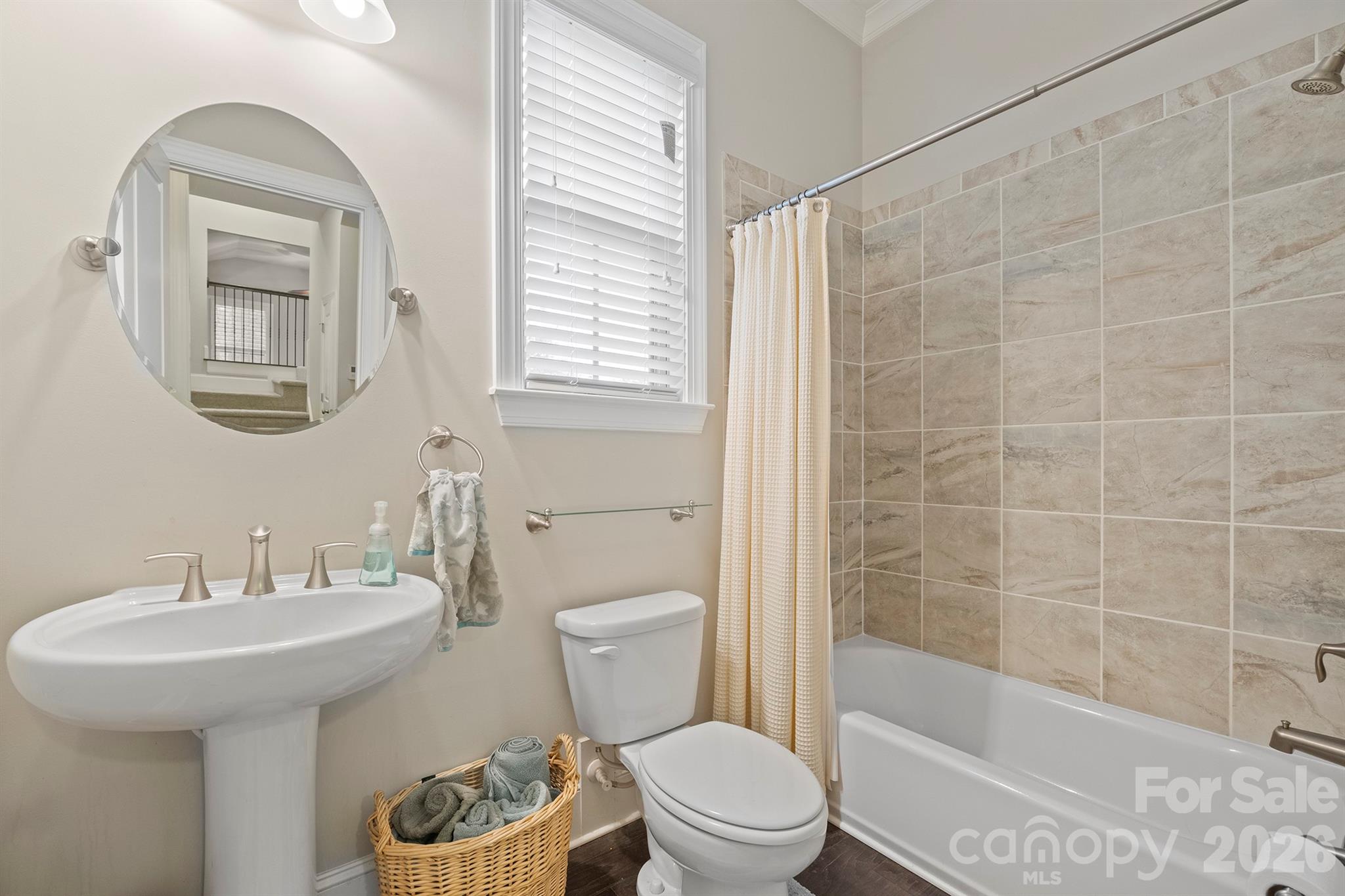 13044 Fen Court Huntersville, NC 28078 - Photo 20 of 43 a bathroom with a sink a toilet and shower