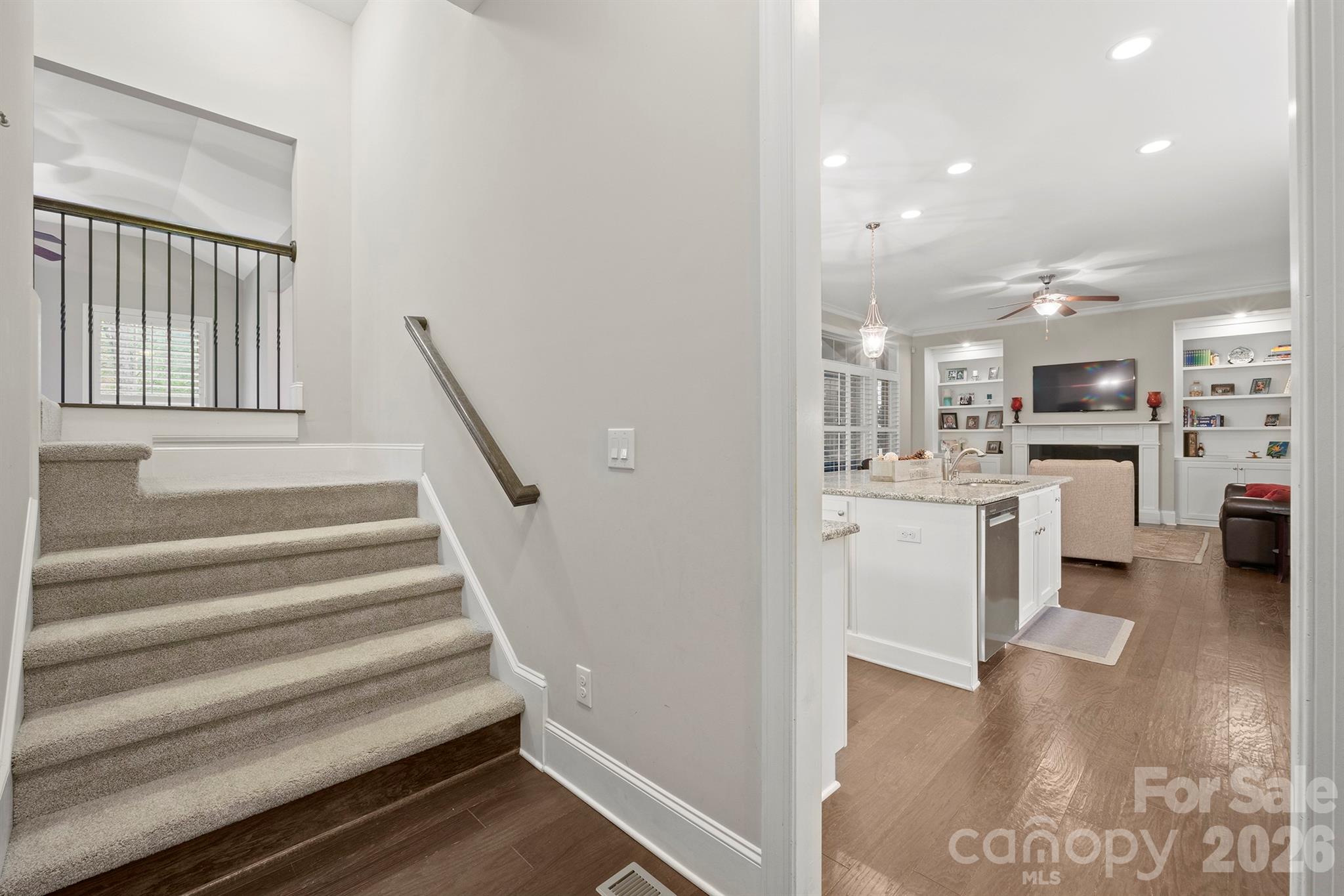 13044 Fen Court Huntersville, NC 28078 - Photo 21 of 43 a kitchen with white cabinets and white appliances