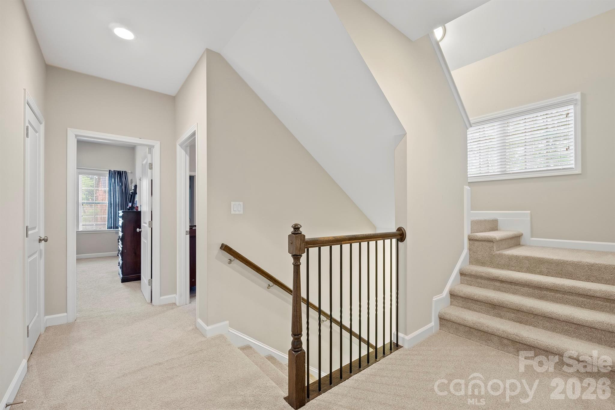 13044 Fen Court Huntersville, NC 28078 - Photo 33 of 43 a view of a hallway with closet and stairs