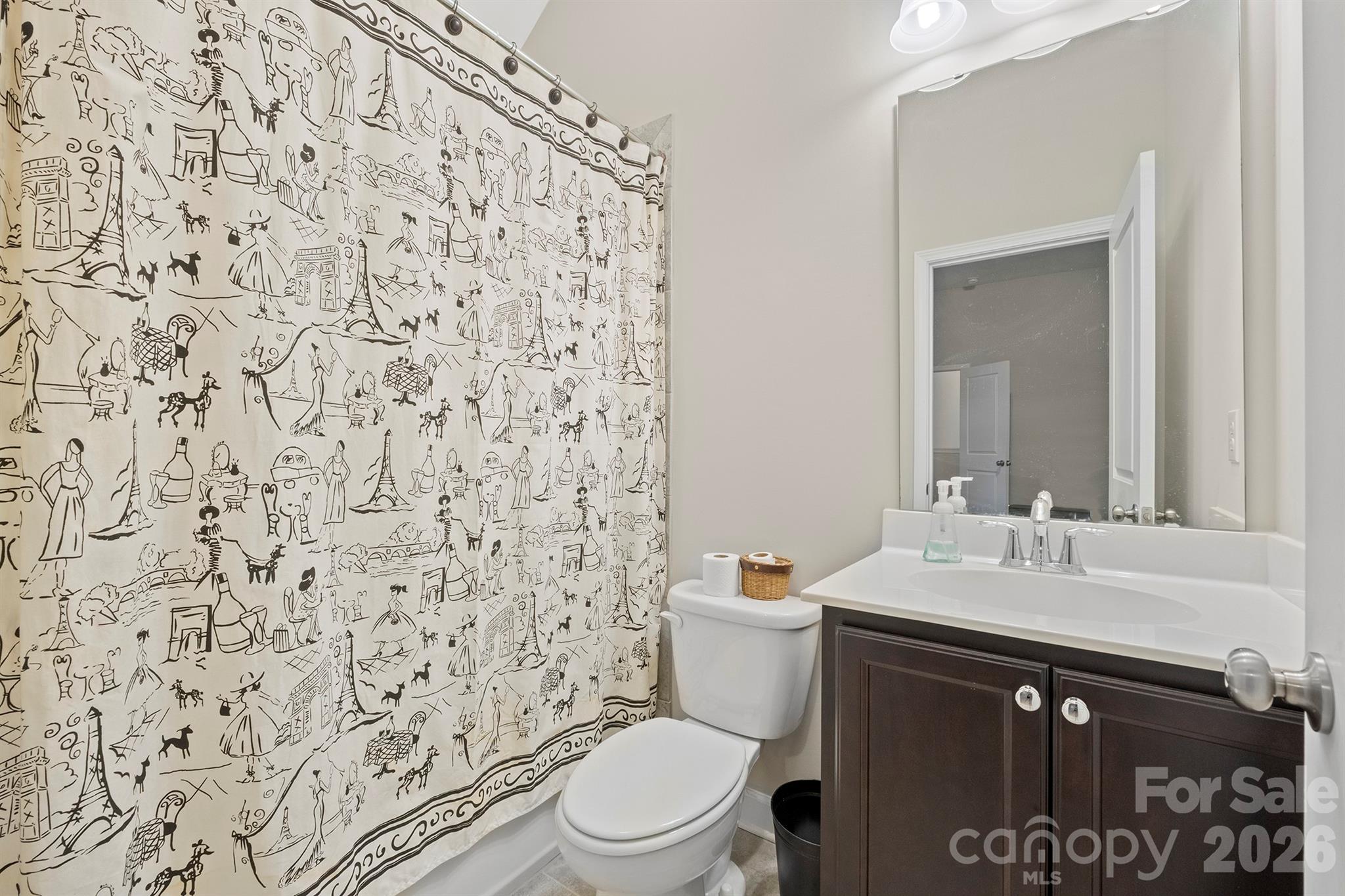 13044 Fen Court Huntersville, NC 28078 - Photo 37 of 43 a bathroom with a sink toilet and mirror