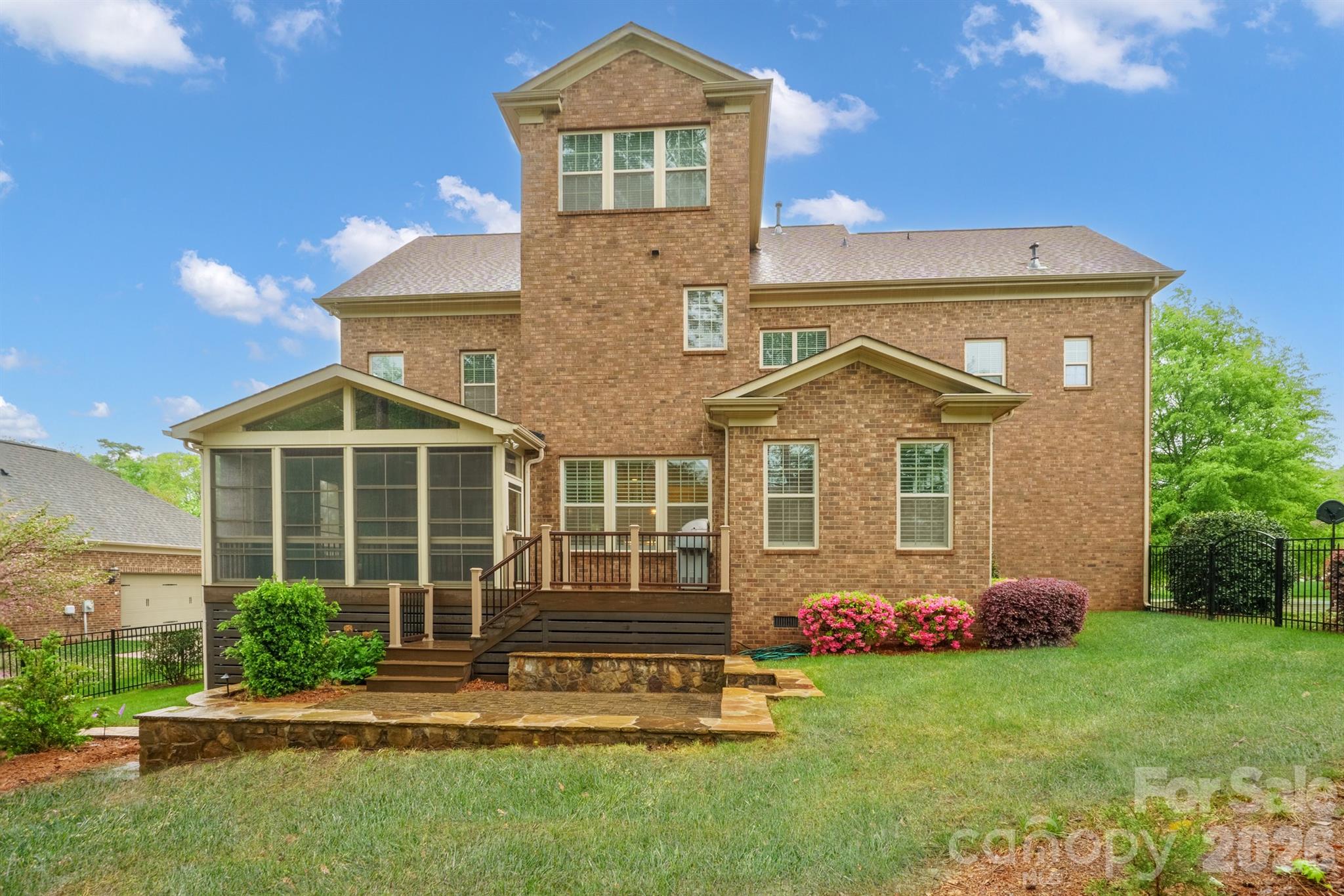 13044 Fen Court Huntersville, NC 28078 - Photo 38 of 43 a front view of a house with garden