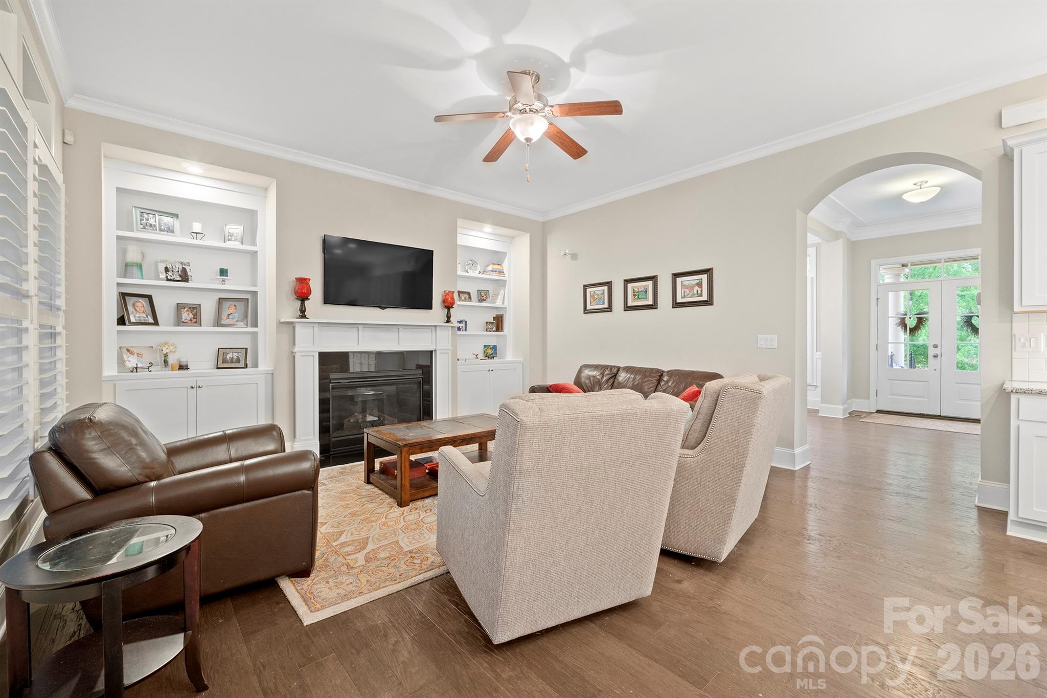 13044 Fen Court Huntersville, NC 28078 - Photo 10 of 43 a living room with furniture fireplace and a flat screen tv