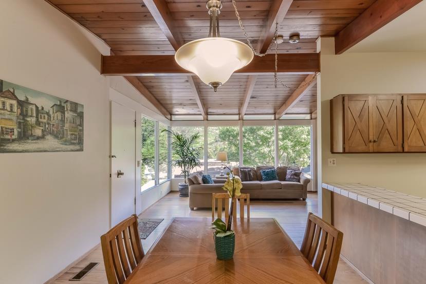 712 Ursula Avenue Pacifica, CA 94044 - Photo 14 of 42 a living room with furniture and a large window