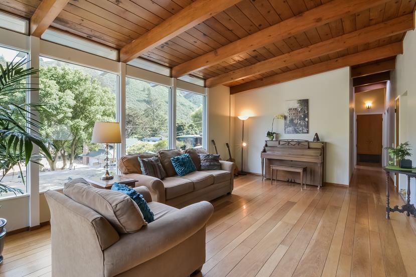 712 Ursula Avenue Pacifica, CA 94044 - Photo 3 of 42 a living room with furniture and a wooden floor