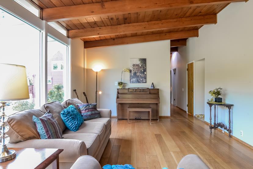 712 Ursula Avenue Pacifica, CA 94044 - Photo 5 of 42 a living room with furniture and a wooden floor