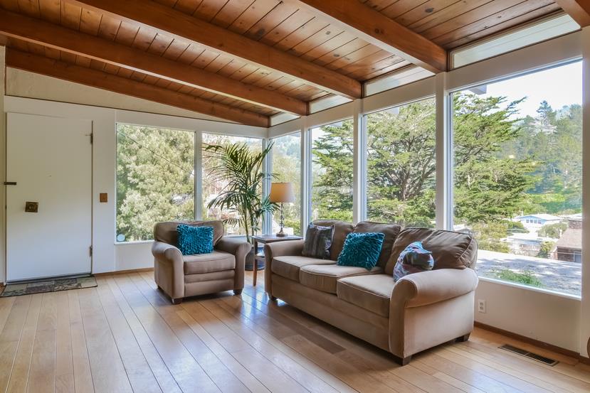 712 Ursula Avenue Pacifica, CA 94044 - Photo 6 of 42 a living room with furniture and a large window