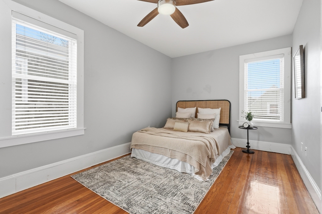 20 Ripley Road, Unit 3 Boston, MA 02121 - Photo 14 of 27 a bedroom with a bed and a window