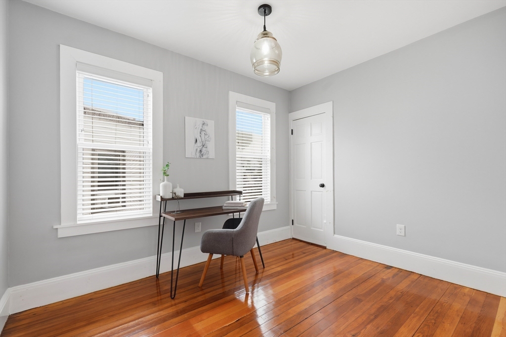 20 Ripley Road, Unit 3 Boston, MA 02121 - Photo 15 of 27 a workspace with wooden floor