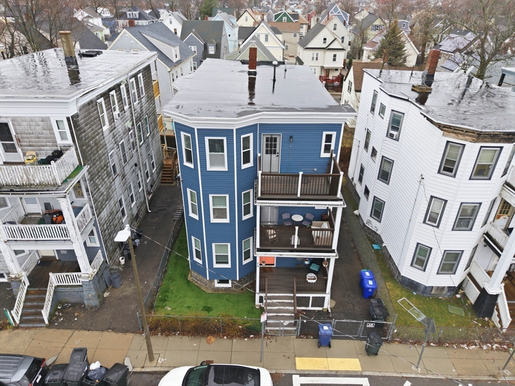 20 Ripley Road, Unit 3 Boston, MA 02121 - Photo 25 of 27 front view of a building with a street