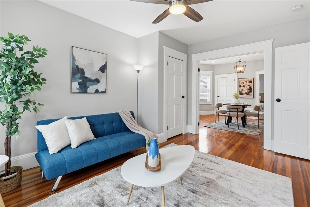 20 Ripley Road, Unit 3 Boston, MA 02121 - Photo 5 of 27 a living room with furniture and a wooden floor