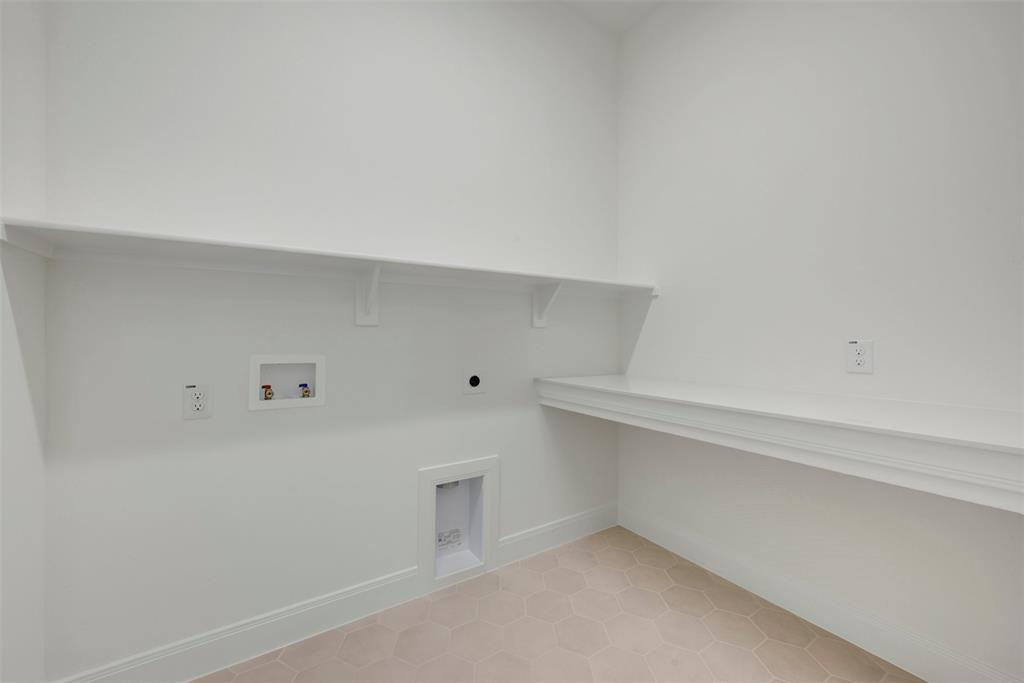 1908 Cola Drive Van Alstyne, TX 75495 - Photo 26 of 29 Laundry area with white walls and baseboards