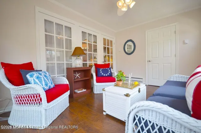 a living room with furniture and a window