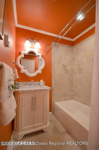 a bathroom with a bath tub