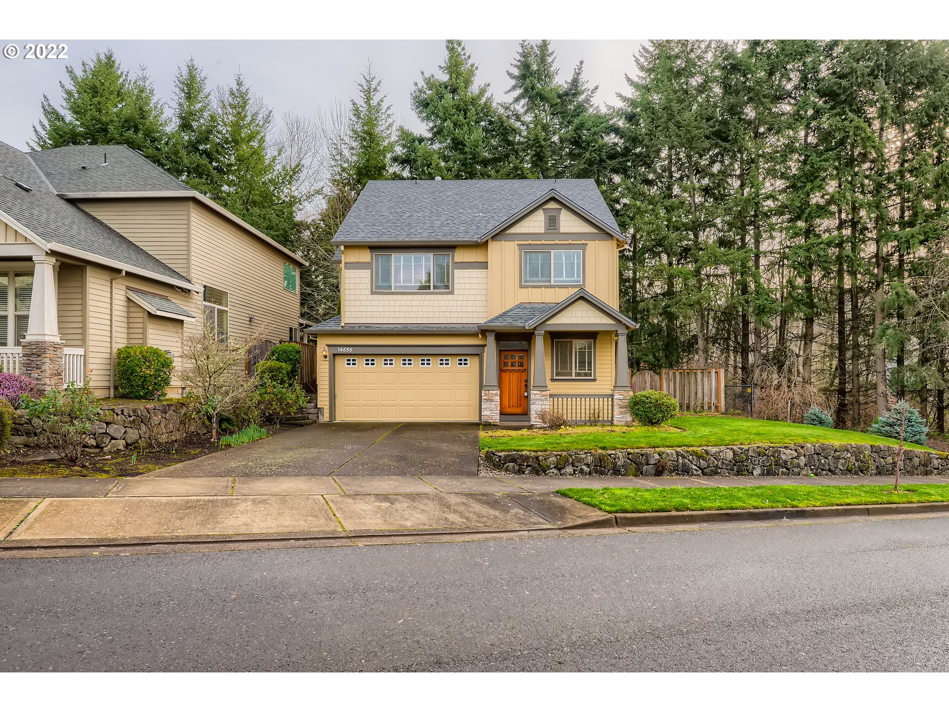 14656 Southwest 164th Avenue Tigard, OR 97224 - Photo 1 of 31 a front view of a house with a yard