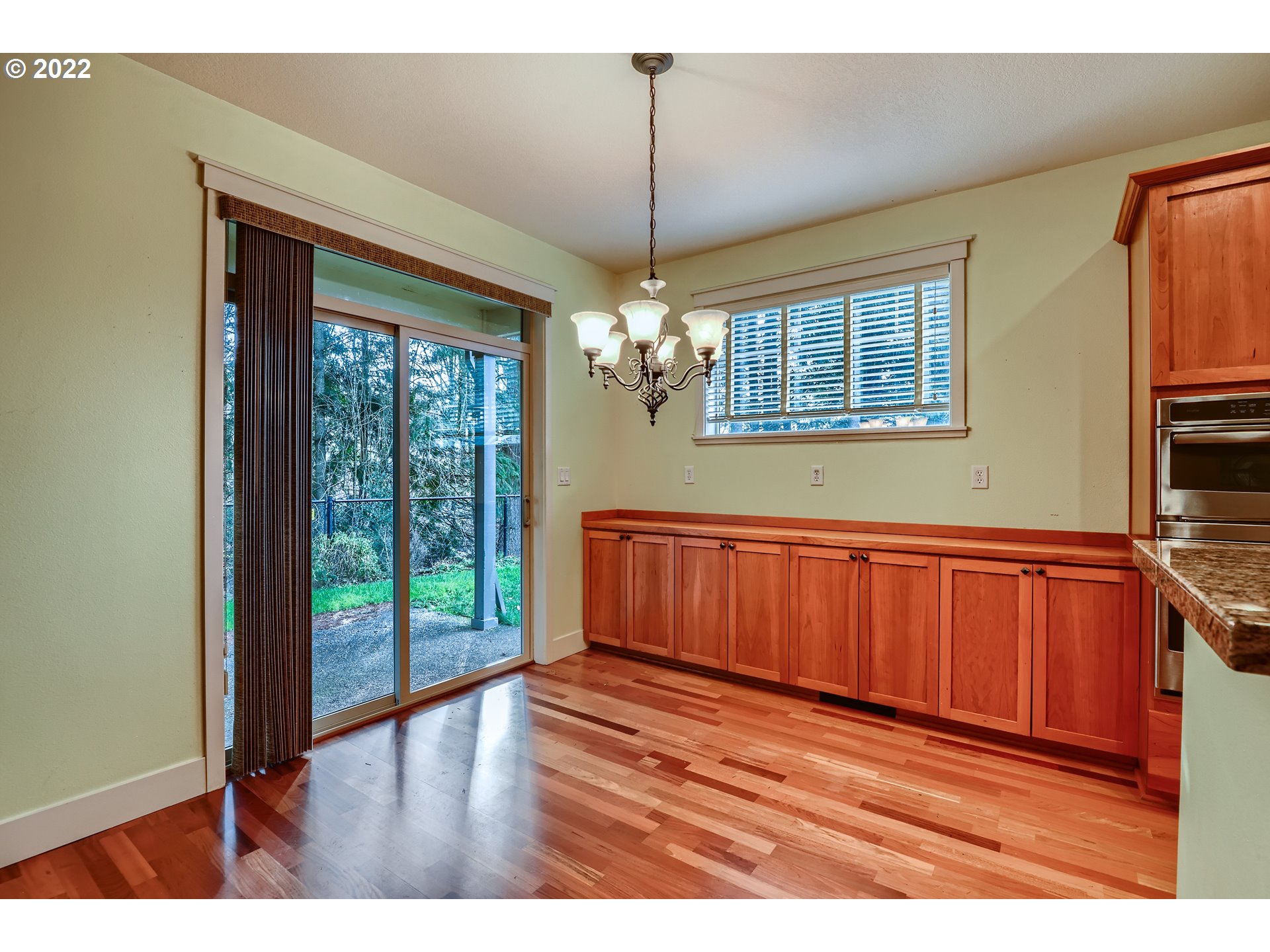 14656 Southwest 164th Avenue Tigard, OR 97224 - Photo 11 of 31 a view of a room with wooden floor and windows