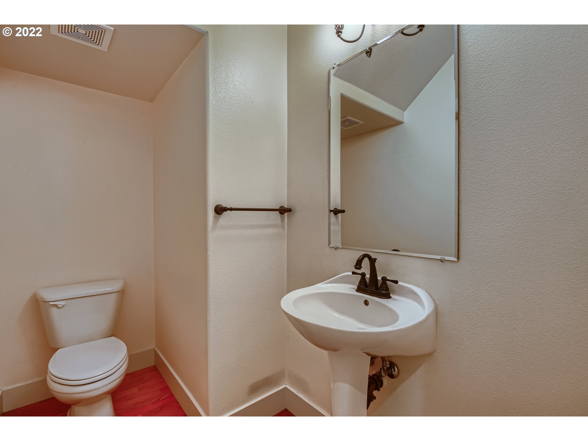 14656 Southwest 164th Avenue Tigard, OR 97224 - Photo 15 of 31 a bathroom with a sink and a toilet