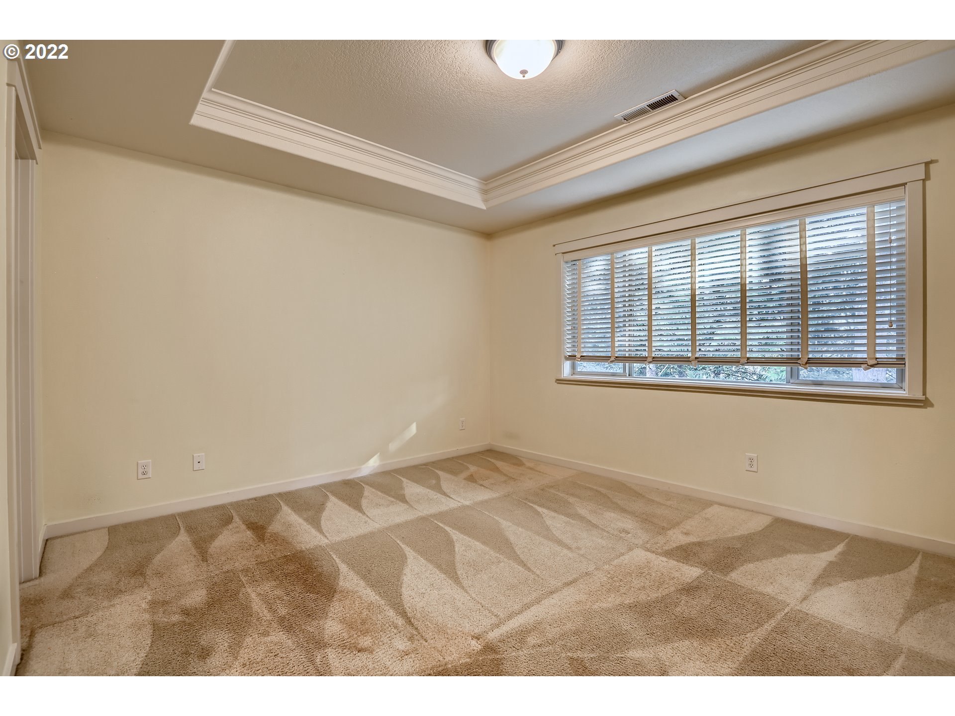 14656 Southwest 164th Avenue Tigard, OR 97224 - Photo 16 of 31 a view of an empty room with a window