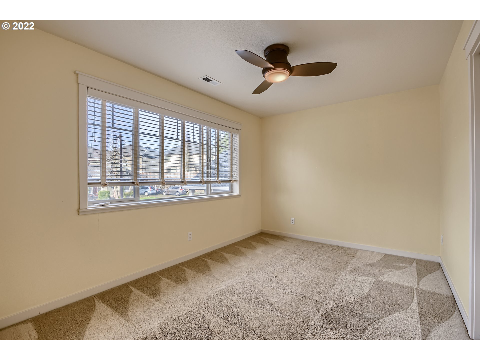 14656 Southwest 164th Avenue Tigard, OR 97224 - Photo 22 of 31 a view of an empty room with a window