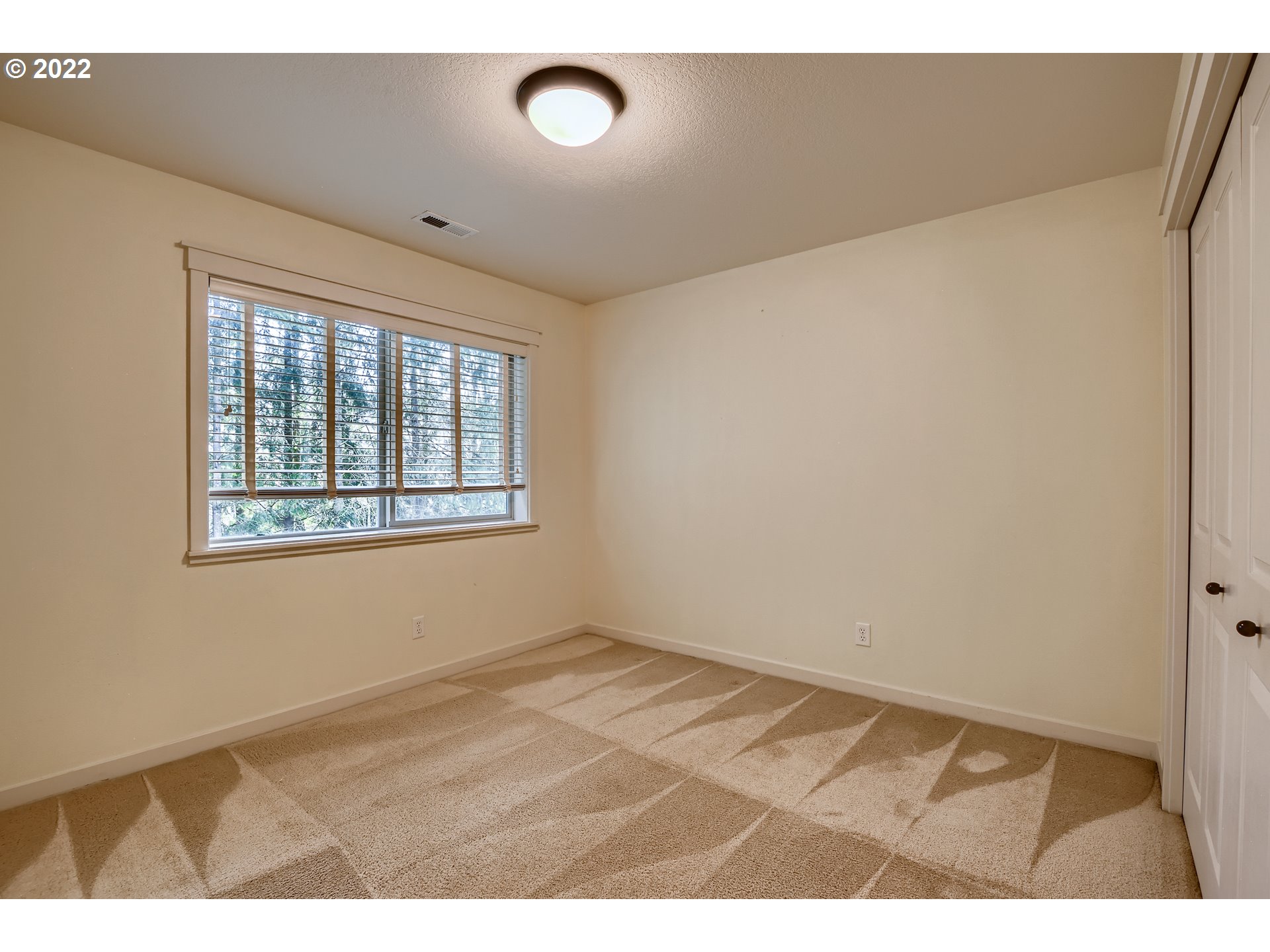 14656 Southwest 164th Avenue Tigard, OR 97224 - Photo 26 of 31 a view of an empty room with a window