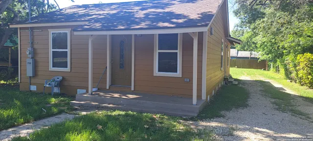a view of a back yard of the house