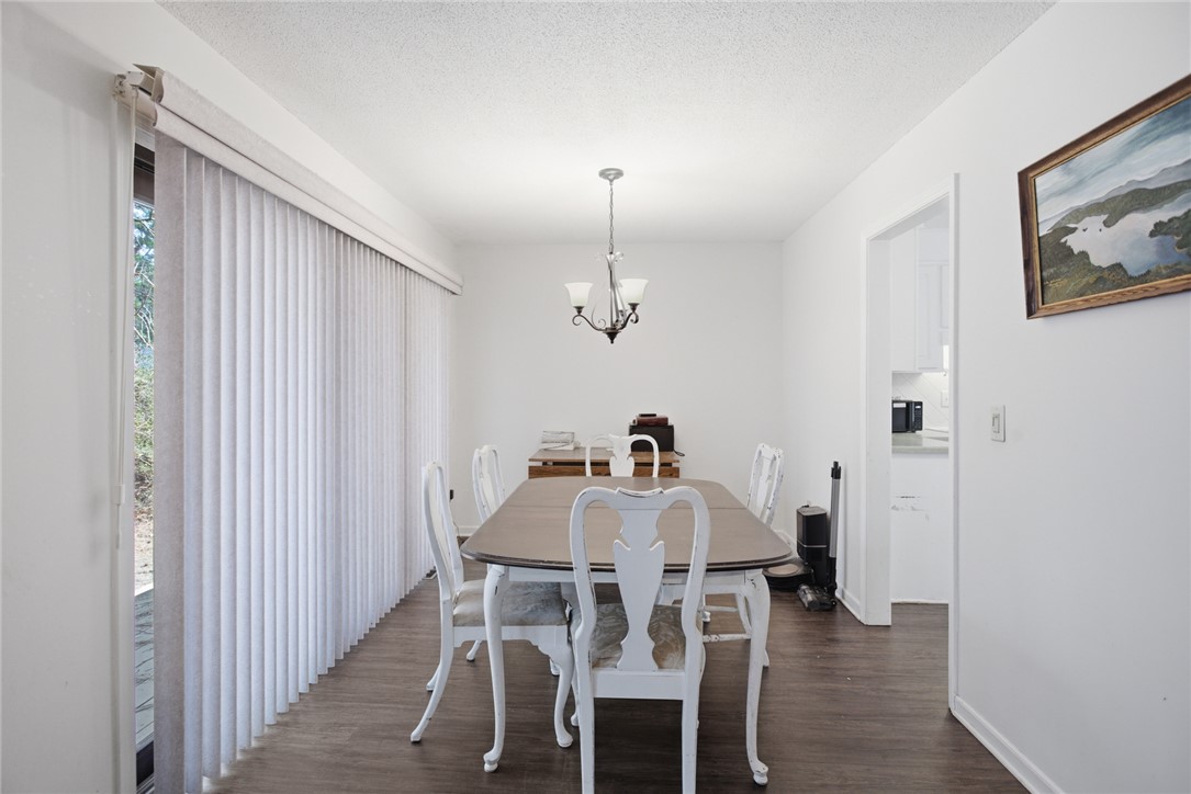308 Wildwood Road Walhalla, SC 29691 - Photo 10 of 23 This inviting dining area features ample natural light and seamless access to outdoor living.