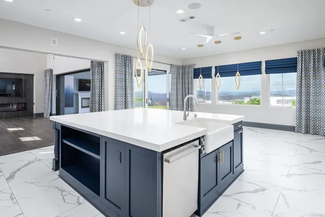 a spacious bathroom with a double vanity sink mirror and a bathtub