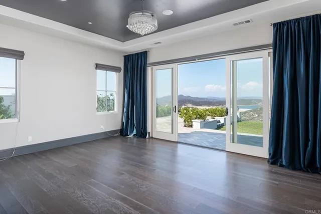 a bathroom with a sink vanity and mirror