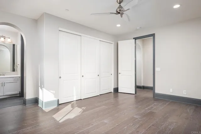 a view of a floor to ceiling window and an ocean view