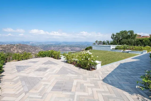 a view of a tree in front of a house