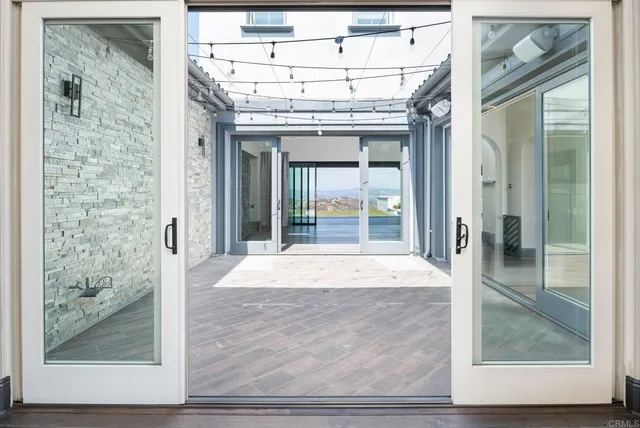 a kitchen with a stove sink and cabinets