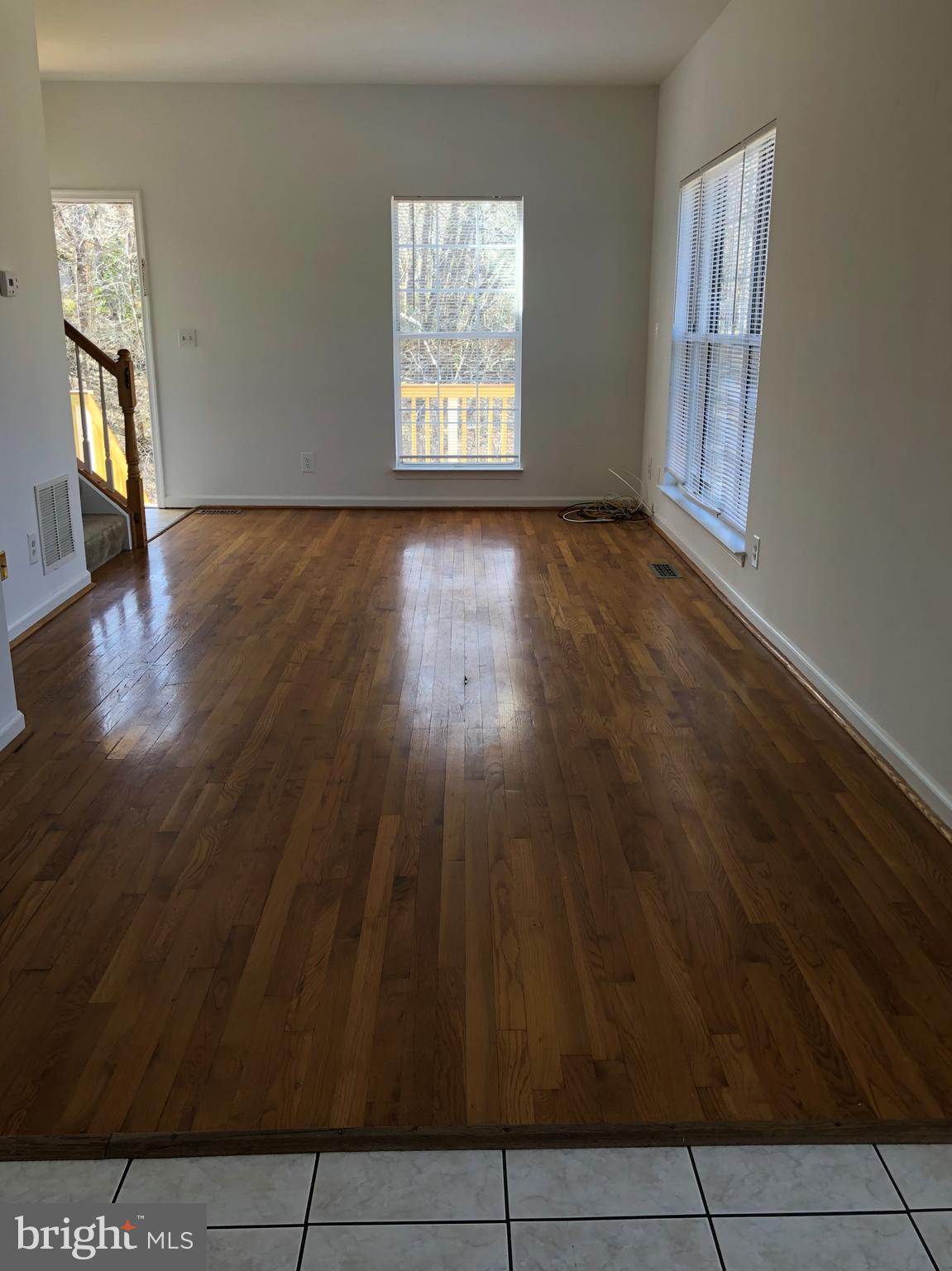 15673 Viewpoint Circle Dumfries, VA 22025 - Photo 13 of 58 Spacious Living Room w/ Hardwood Flooring