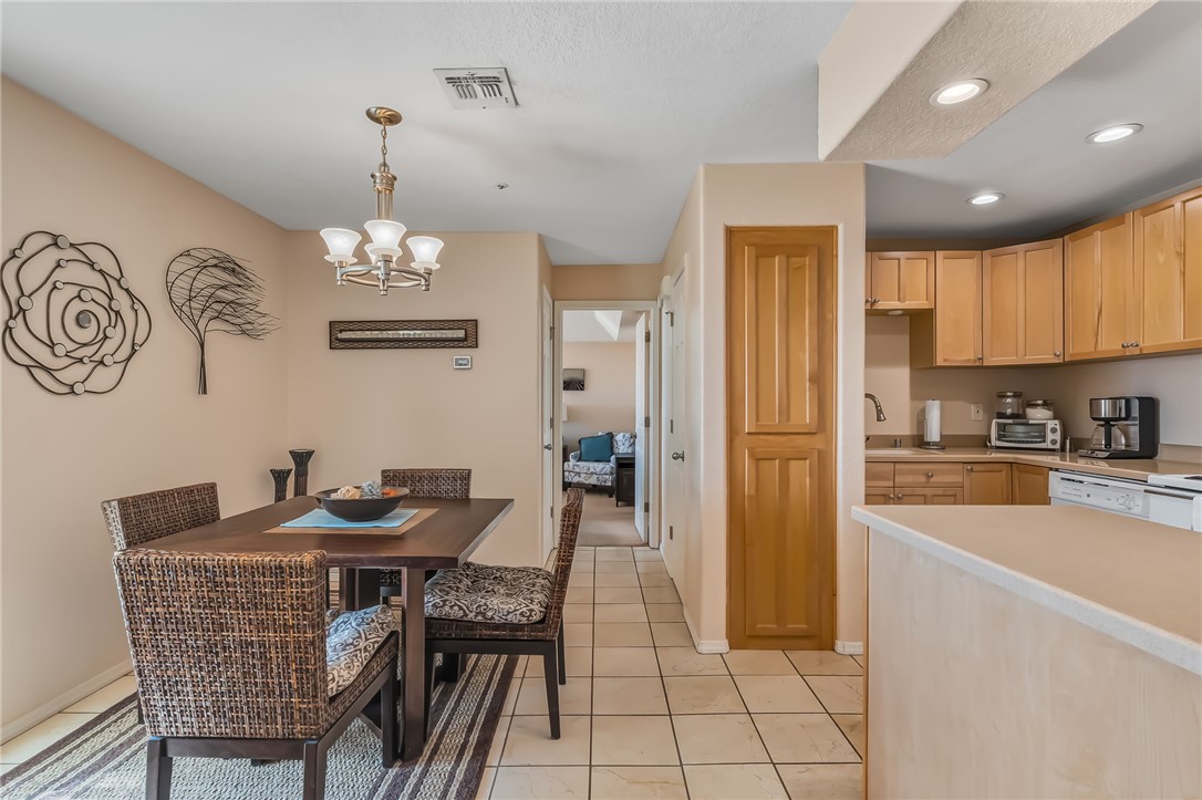 3408 Sunriver Road, Unit 208 Bullhead City, AZ 86429 - Photo 12 of 47 a view of a dining room with furniture