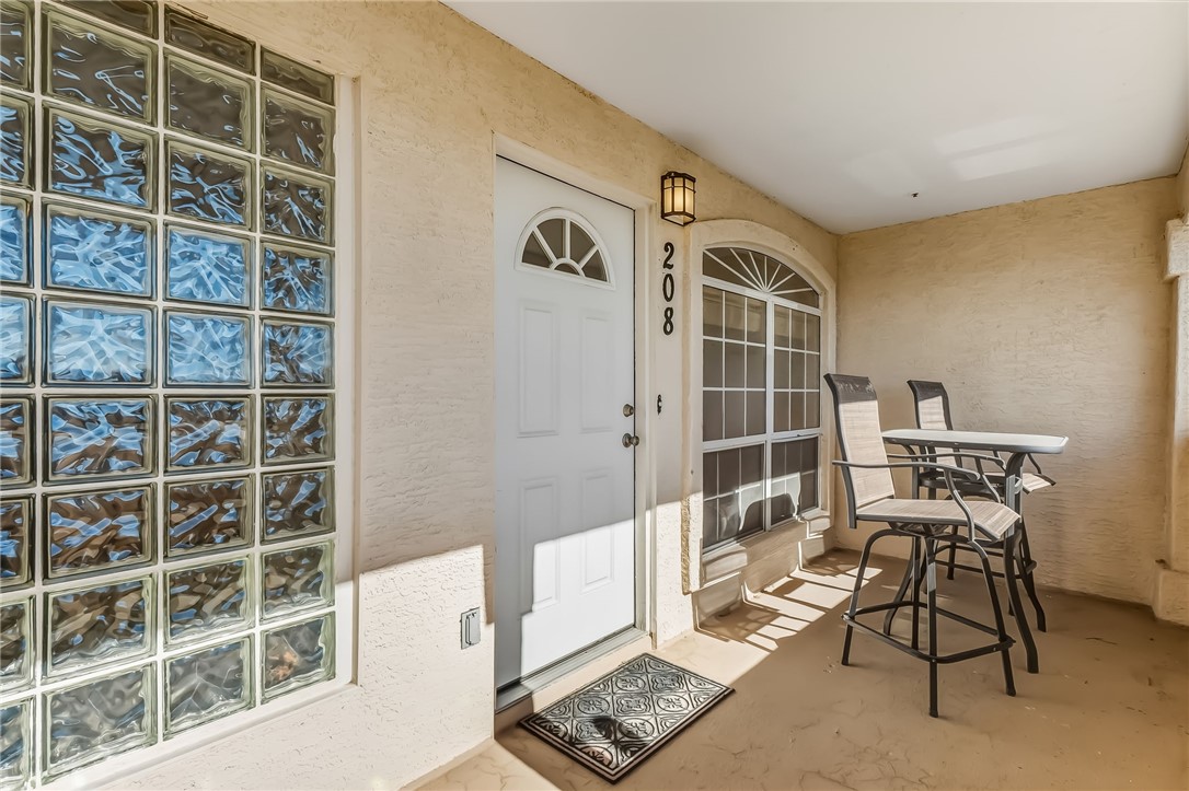 3408 Sunriver Road, Unit 208 Bullhead City, AZ 86429 - Photo 2 of 47 a view of workspace with wooden floor and windows