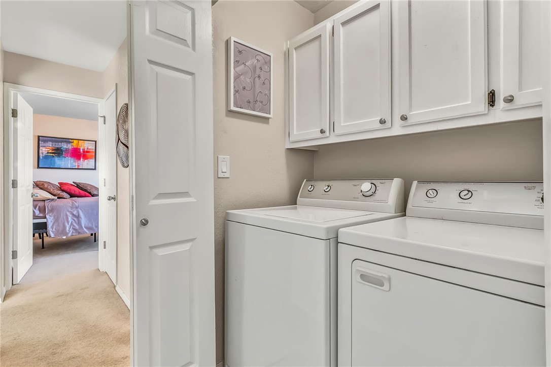 3408 Sunriver Road, Unit 208 Bullhead City, AZ 86429 - Photo 30 of 47 a utility room with dryer and washer