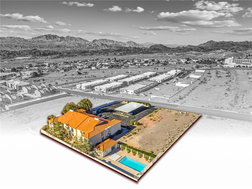 3408 Sunriver Road, Unit 208 Bullhead City, AZ 86429 - Photo 45 of 47 an aerial view of a residential houses with outdoor space