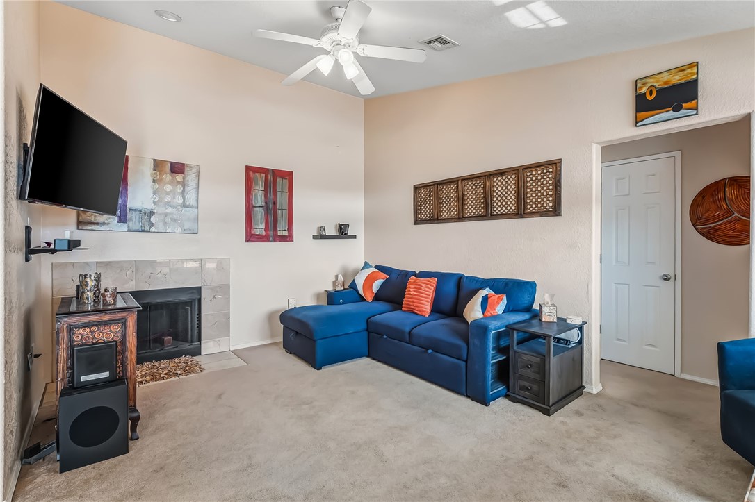 3408 Sunriver Road, Unit 208 Bullhead City, AZ 86429 - Photo 7 of 47 a living room with furniture and a flat screen tv